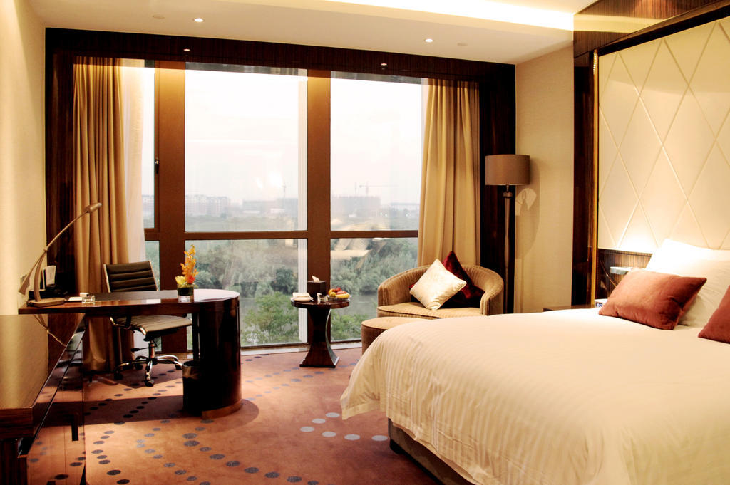 New Century Grand Hotel Nanxun Huzhou Oda fotoğraf